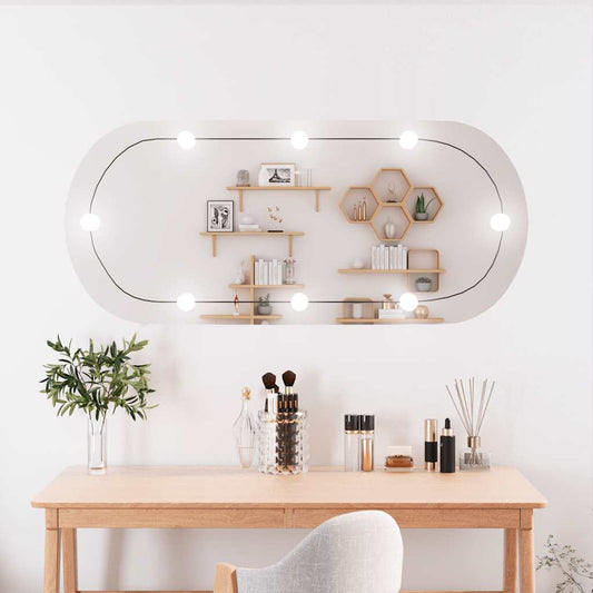 Väggspegel med LED-belysning 45x100 cm glas oval